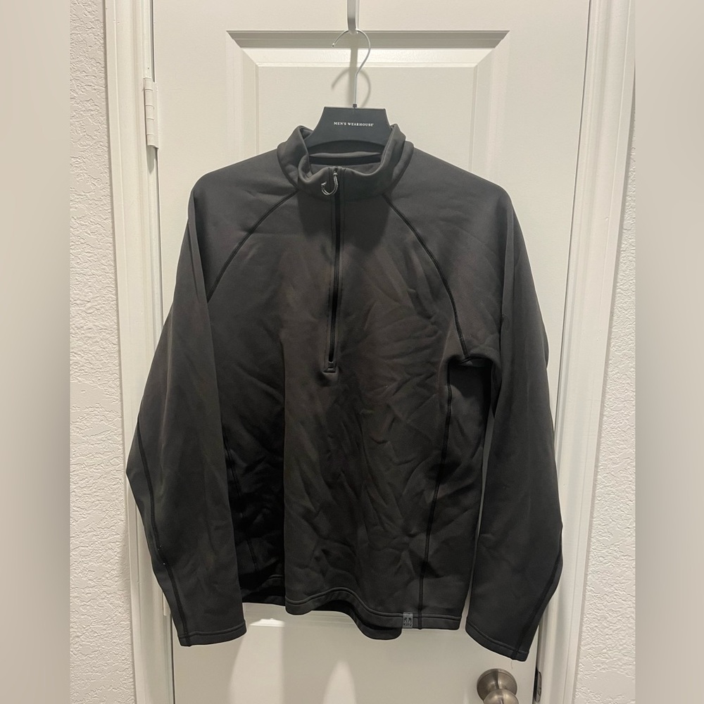 Men’s Kuiu Peloton 200 quarter zip pullover.